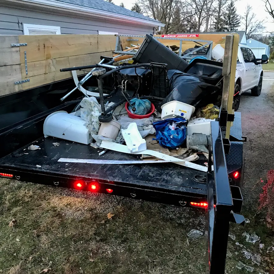 Roll-off dumpster delivered to a residential driveway in Flagler Estates
