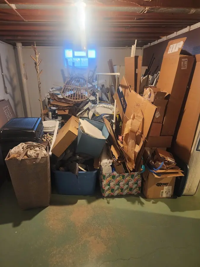 Roll-off dumpster container at job site for 4 Yard Dumpster Rental in Flagler Estates